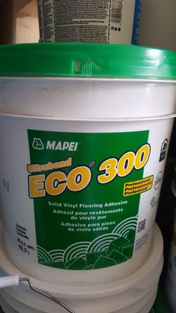 Adhesive for vinyl plank