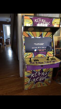 Bran new full size arcade with 32 inch TV and 12,990 games