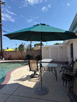 Patio umbrella  8 foot  diameter with metal base