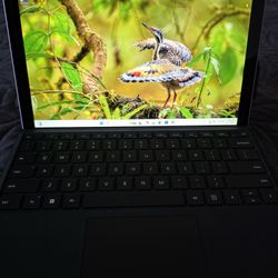 Powerful Microsoft Surface Pro. has Windows 11 and an Intel Core i7 7th Gen processor. Comes with 16GB RAM and a spacious 1TB SSD. Keyboard cover is i