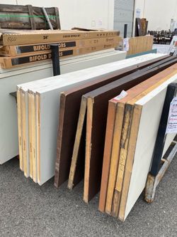 Solid doors and bifold doors - parking lot deal- $15 ea. Time of purchase pickup.