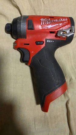 Milwaukee Fuel Cordless Impact Driver with battery and charger