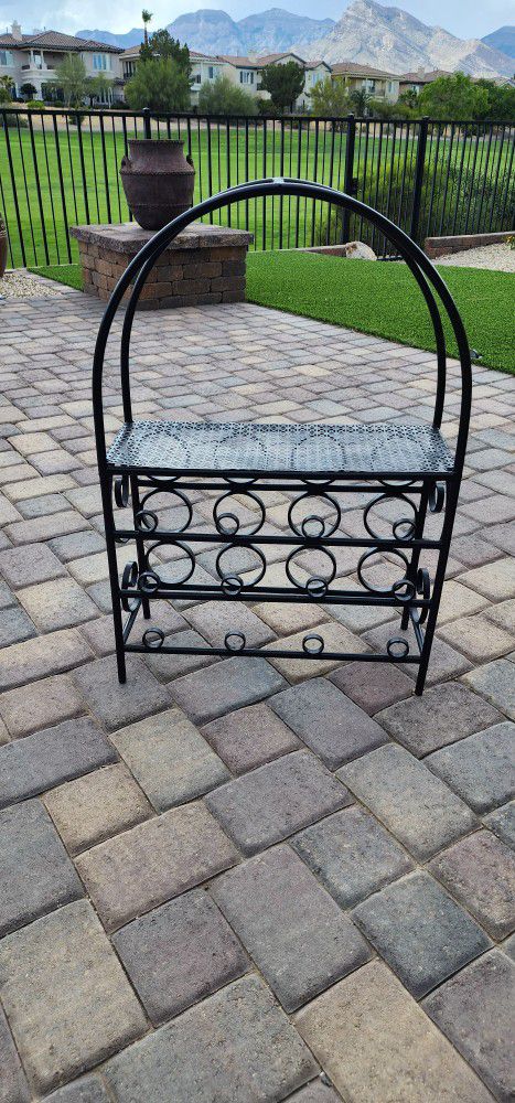Heavy Metal 12 Bottle Wine Rack With Shelf.  36" x 25" x 10".

Freshly Painted and ready to enhance your interior or exterior decor.