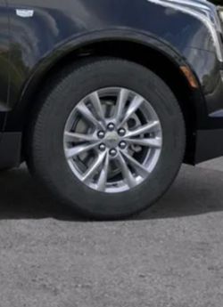 New  XT5  factory 18” Wheels & Tires