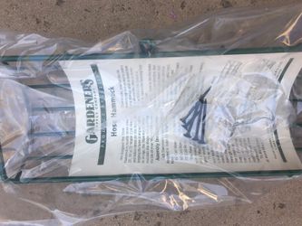 Hose hammock for lightweight coiled hose
