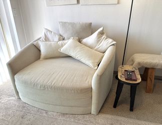 Living Spaces Cuddler Sofa Swivel