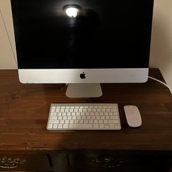 Apple iMac 21.5-inch 2.7GHz Quad-core i5 (Late 2012) with wifi keyboard and mouse.