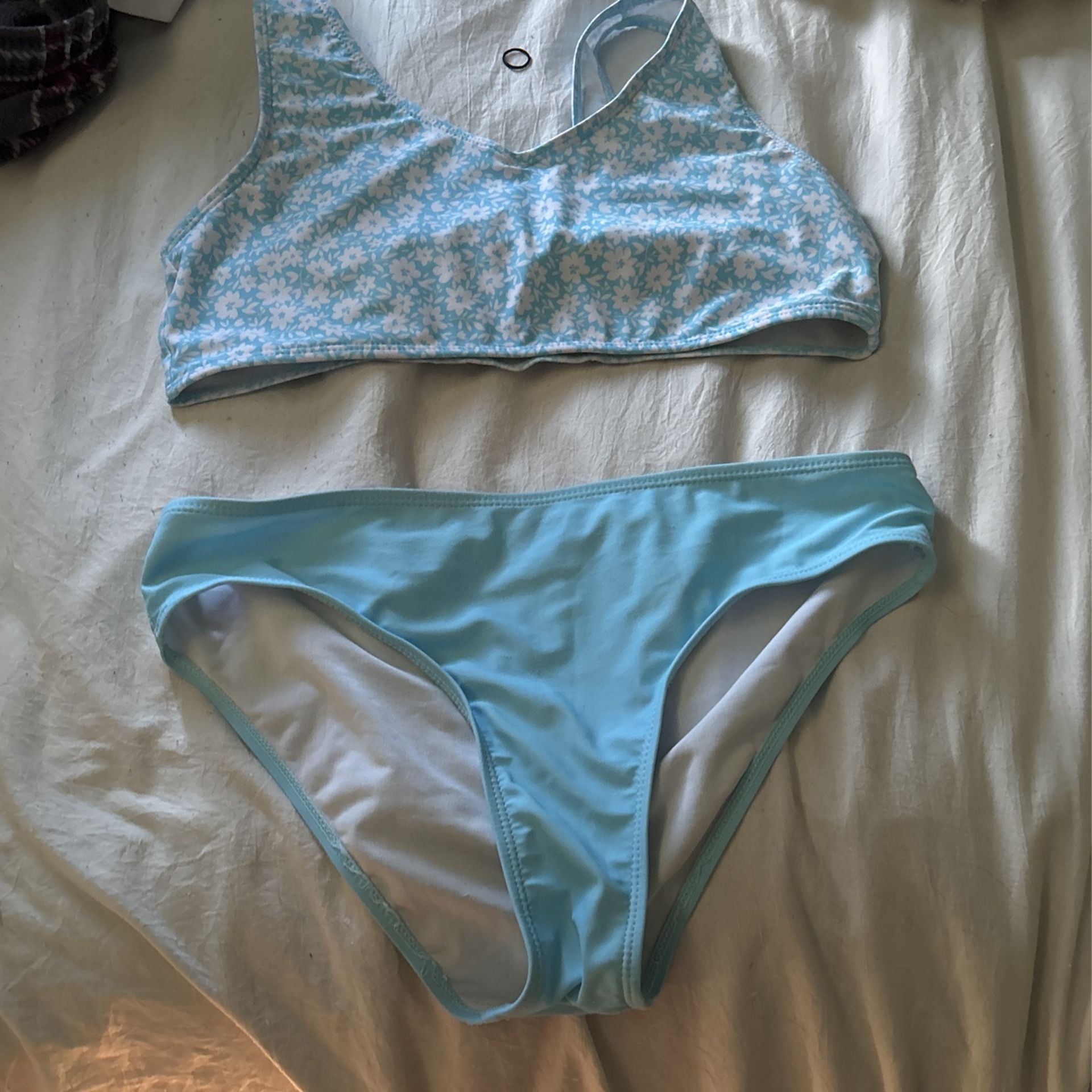 blue swimsuit with white flowers