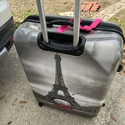 50 pounds or more Suitcase