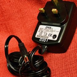 NEW-DVE 9V Switching Adapter Power Supply DSA-0151F-09 K —100-240V input