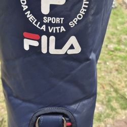 Fila Golf Bag with a Putter, 5,6 and 7 iron Driver And 3 wood
