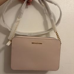 Pink Michael Kors over the shoulder 