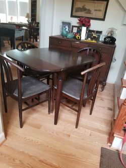 Oak table with four matching chairs