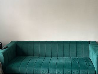 Velvet Emerald green couches with gold legs