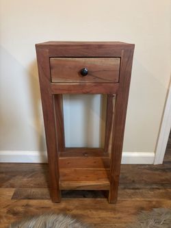 Narrow accent table with drawer