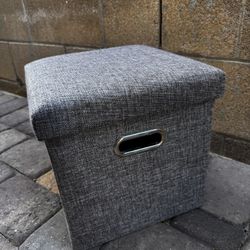 Small gray ottoman with storage