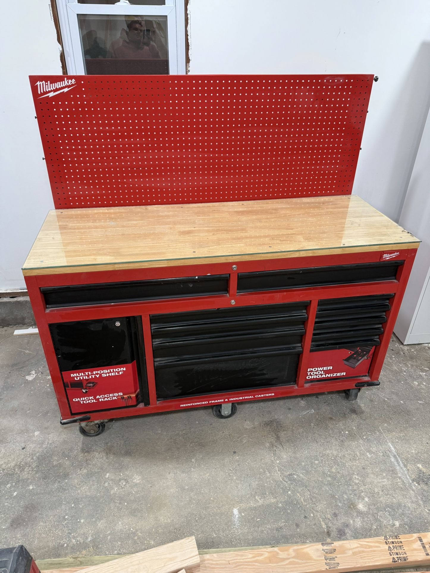 Milwuakee 61 in. 11-Drawer/1-Door 22 in. D Mobile Workbench with Sliding Pegboard Back Wall 