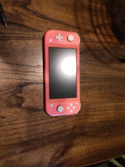 Pink Slightly Used Nintendo Switch With Super Smash Bros. Game