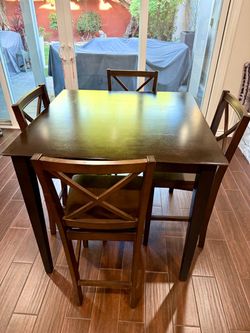 Dining Table + 4 Matching Chairs – $200