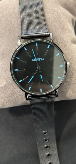 Reduced! Only $10! Very thin dressy black watch with blue hands. Super low price!
