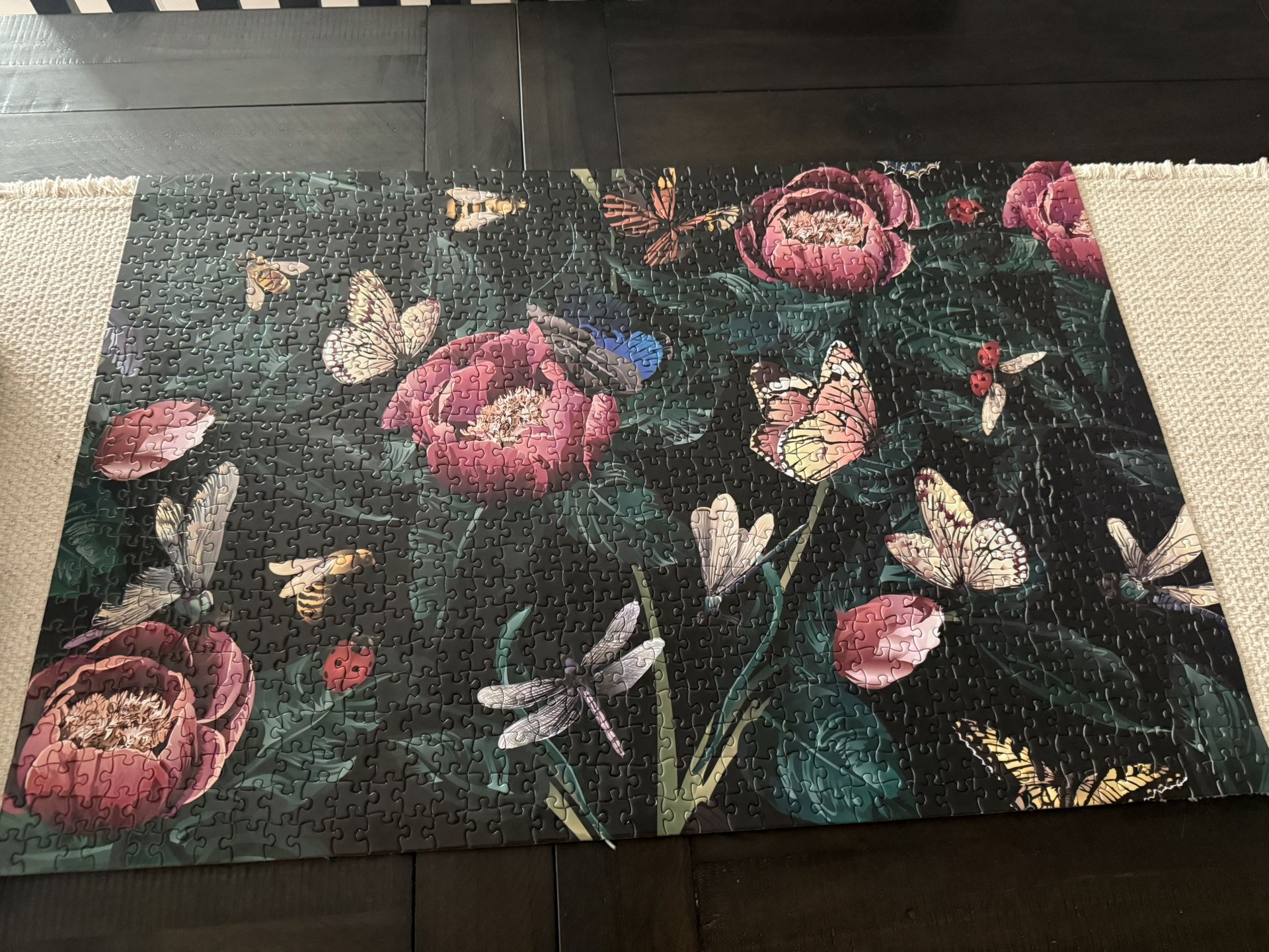 1000 piece floral jigsaw puzzle, completed. Would make gorgeous wall art, or if you would prefer it deconstructed, let me know! Pet and smoke free hom