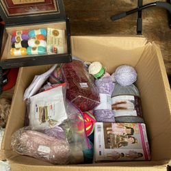 Box full of new yarn pattern packs