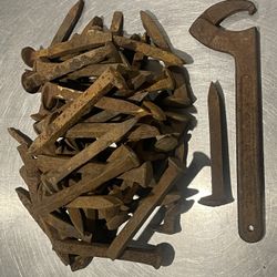 Antique Railroad Spikes and Spanner Wrench