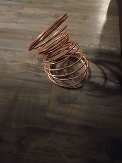 Solid copper tubing and antique teapot