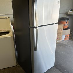 Silver GE® 17.5 Cu. Ft. Top-Freezer Refrigerator can deliver  1 year old Retail price $649