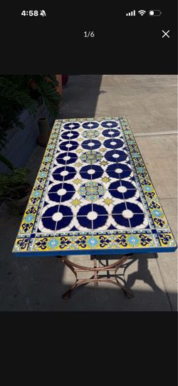 Beautiful solid iron base mosaic top table