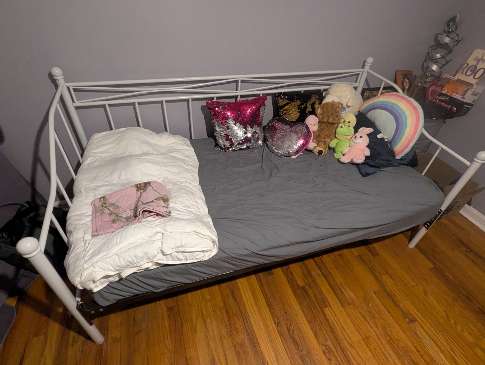 Twin size bed with mattress. Comes with everything in the photos if wanted. Sheet protector included.