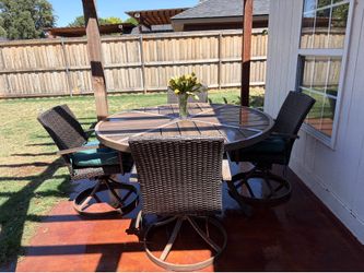 59” Large wood grain metal patio table with 4-6 swivel chairs/cushions