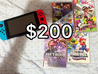 Nintendo Switch + 4 GAMES INCLUDED