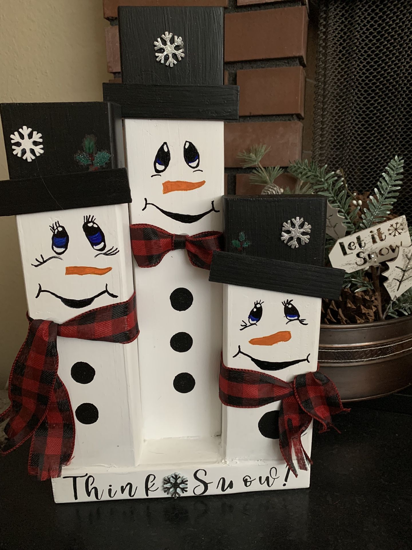 Handmade locally Wooden Snowmen