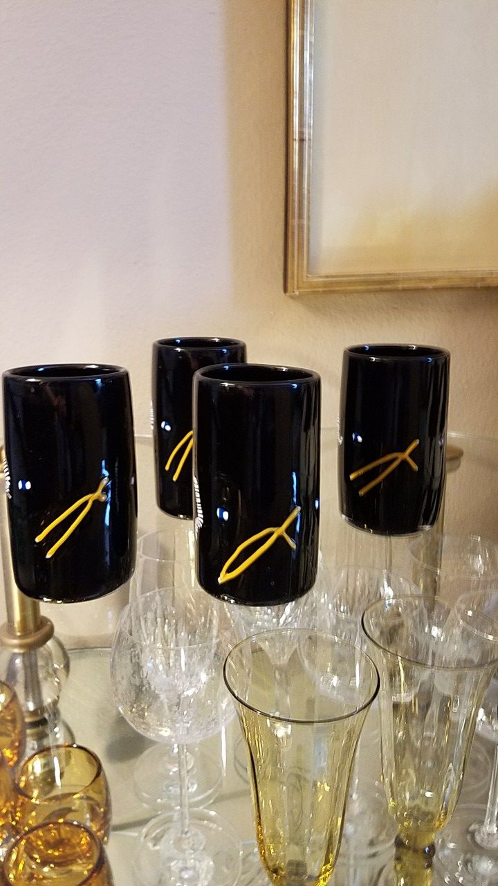 Four signed hand blown glasses