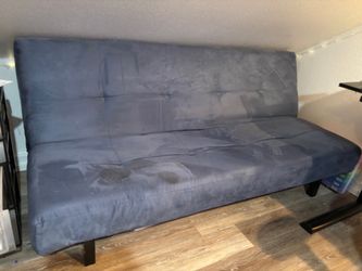 Solid futon. Steel frame, works perfect. Free