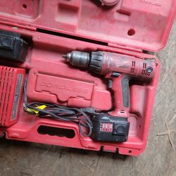 Milwaukee heavy duty drill cordless with case and charger 3 dead batteries

