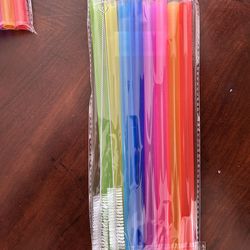 Straw packs with cleaning tool