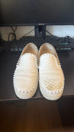 Christian Louboutin Pik Boat sneakers.