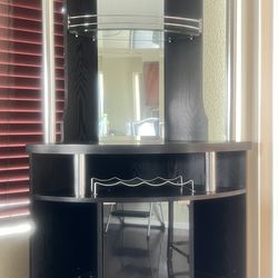 Black bar cabinet must go