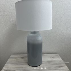 Lamp with ceramic base and chrome frame finish