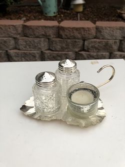 Beautiful Salt and Pepper Shaker and candle holder on leaf