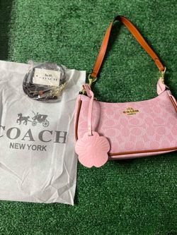 Pink powder Coach bag