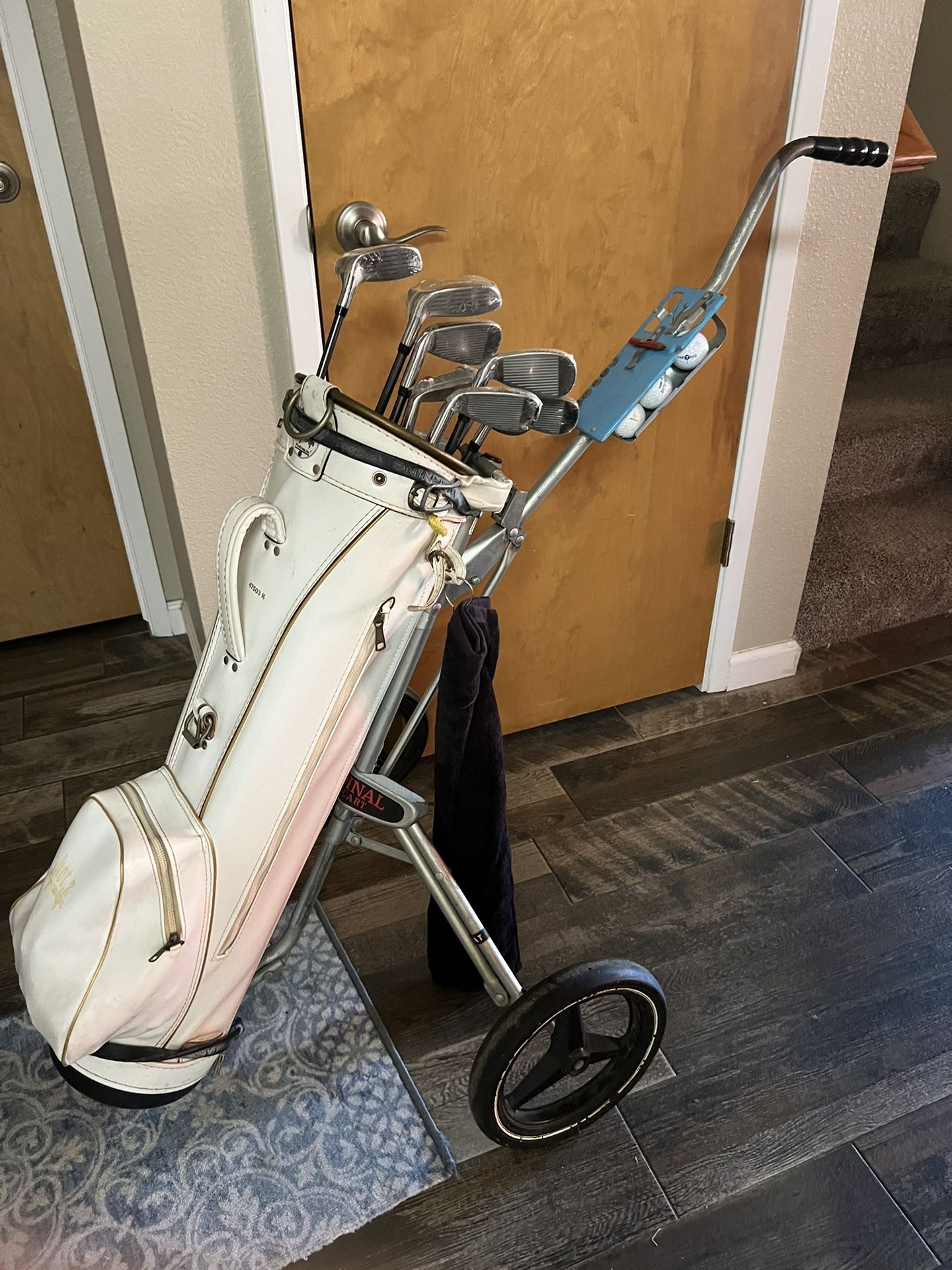 Amazing condition HOT Z Golf Bag with extendable wheel base with SEALED Power Play Golf Clubs.  MANY NICE GOLF BALLS IN LARGE POCKET.  $200