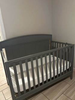 Baby crib and mattress