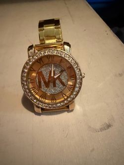 MK watch in excellent condition with new battery