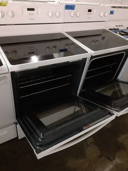 Whirlpool glass top electric stove working perfectly with 4 months warranty
