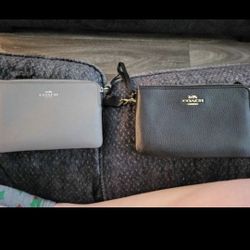 Two Authentic Coach Zipper Clutches