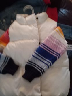 Old Navy Puffer Vest, Rainbow Knit Sweater and Ballerina Stretch Jeans.