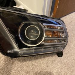 Stock OEM 2013/14 Mustang Projector Headlights. 
